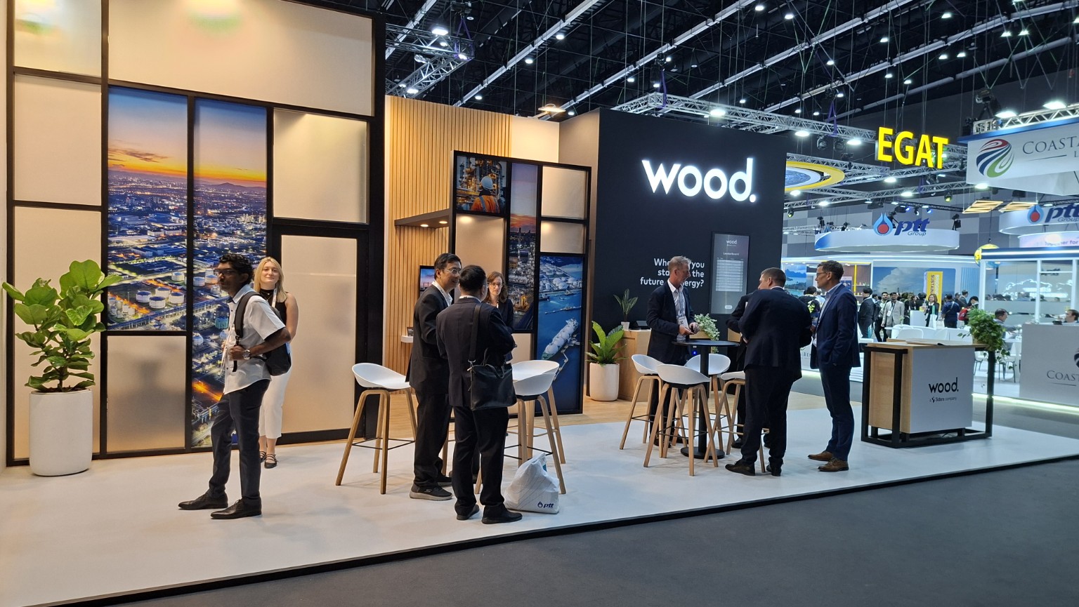 Delegates meeting at Wood's Gastech 2026 exhibition stand